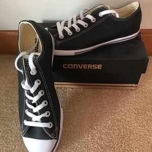 Converse black leather shoes, size 8.